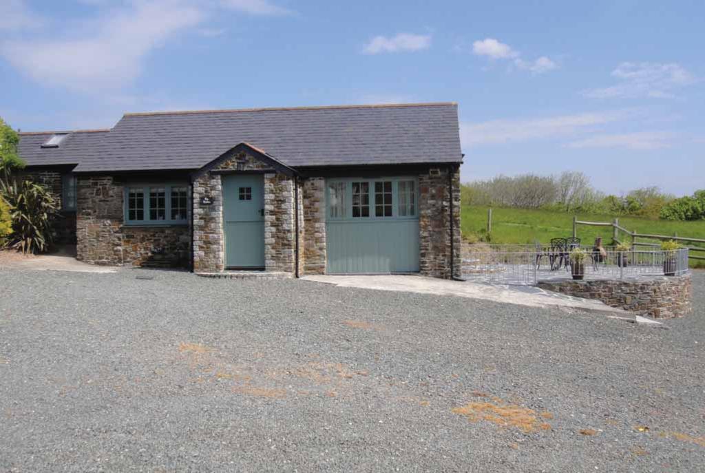 The Holiday Cottages The cottages are predominantly situated around a courtyard, and have been converted to a high specification from a range of farm buildings of stone construction under slate roofs.