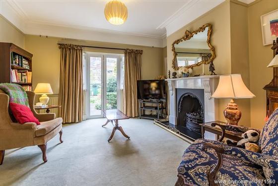 c, interconnecting reception rooms with feature marble fireplaces, bow window to front and access to rear garden via french doors.