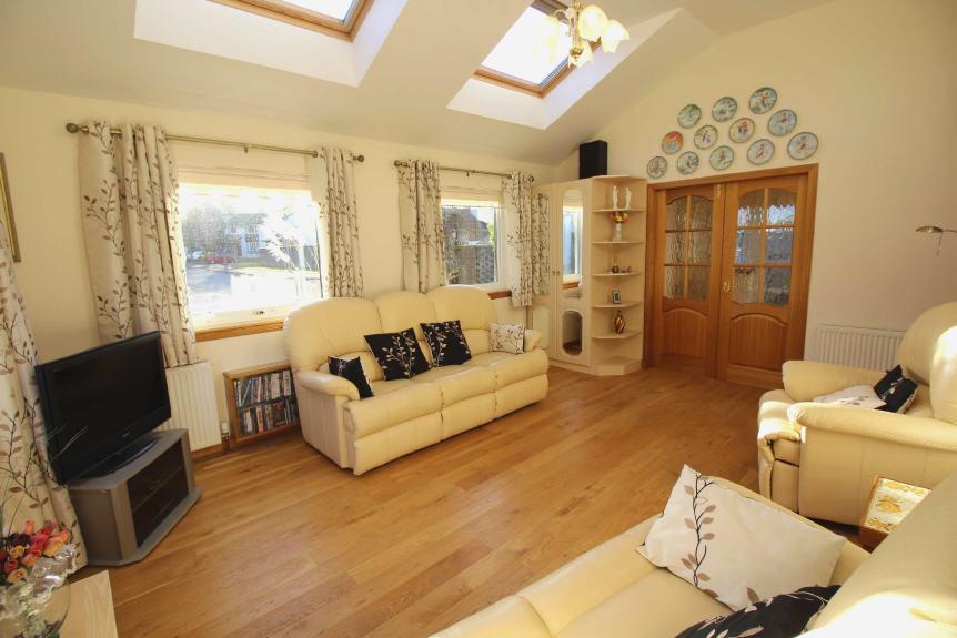 Benefiting from double glazing and gas central heating, this lovely property appreciates real wood flooring in the hall, dining room and lounge.
