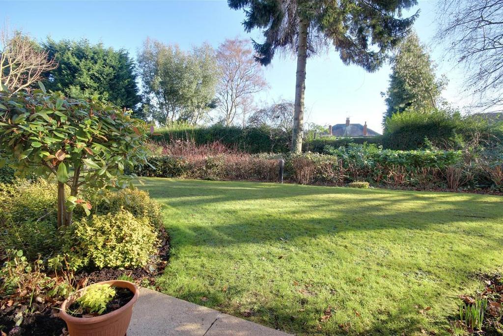 The gardens are mainly lawned and provide areas of interest, places to sit and attractive well stocked borders.