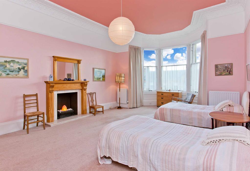 ...The master bedroom would also lend itself to use as a formal drawing room owing to its impressive proportions and wide bay window,