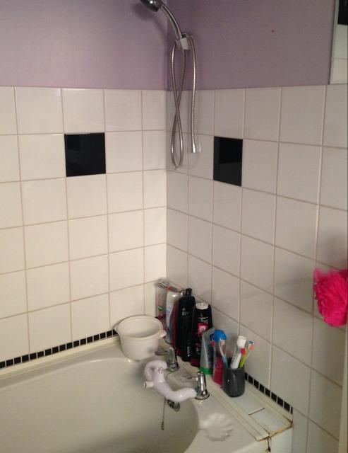 The flooring and the tile and painted walls are in good condition and the grout
