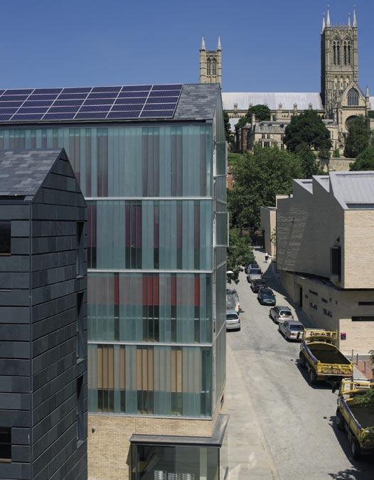 Below Rooftop photovoltaics help supply the building s electricity needs Bottom View of public space created at the corner of Flaxengate and Grantham Street Right The view up Flaxengate towards the