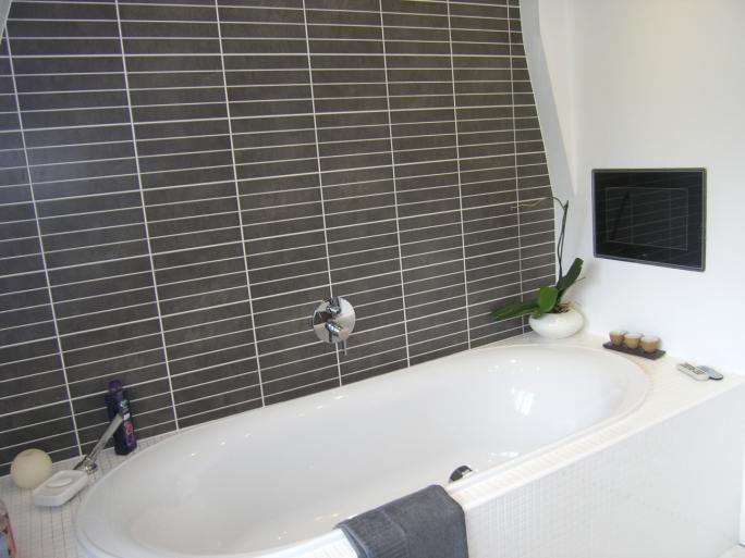 also a television screen with aqua vision remote control fitted to the wall above the bath with built-in speaker/sound system. Bedroom no.