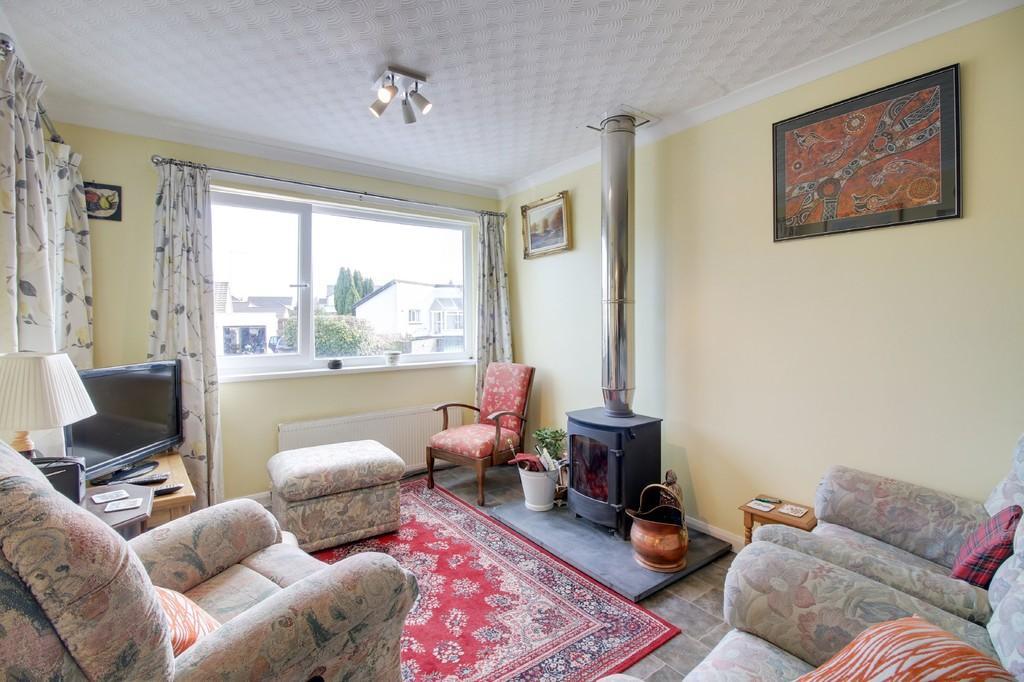 the details On a quiet private road in the heart of the town of Bovey Tracey, a short walk from the shops and eateries, is this detached, four-bedroom family home, with two conservatories, an