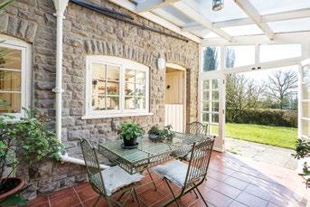 NOVERINGS LODGE BOSBURY, NEAR LEDBURY, HEREFORDSHIRE HR8 1QD AN IMPRESSIVE DETACHED FORMER LODGE HOUSE OFFERING SUPERB FOUR BEDROOMED ACCOMMODATION IN A DELIGHTFUL RURAL LOCATION SET IN A LOVELY