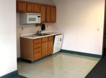 ground floor kitchen/break room Copper/PVC plumbing, ADA compliant restrooms Floor