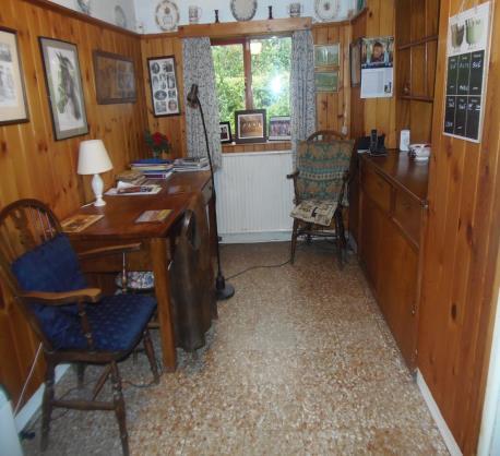 Breakfast Room 4.40 m. x 2.20 m. (14 5 x 7 3 ) with tiled floor and pine panelled walls.