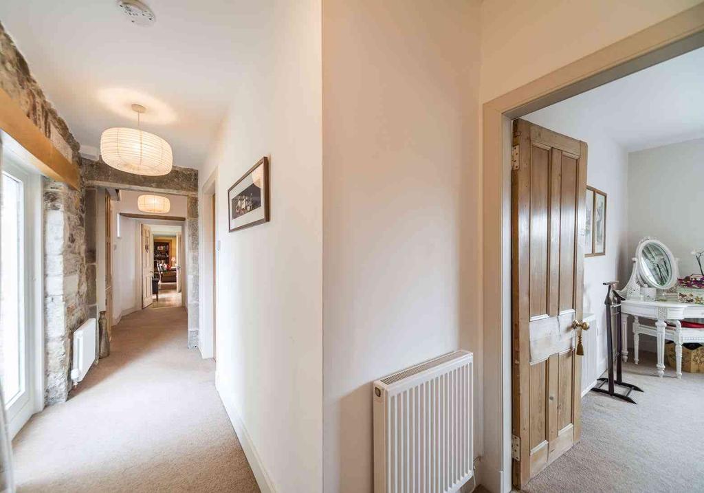 With original stone walls The Hallway The property briefly comprises entrance porch, welcoming hall, spacious,