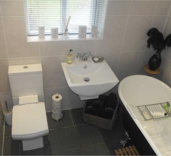 (213m x 201m ) Superbly fitted out with a wall mounted hand basin with mixer tap above, low