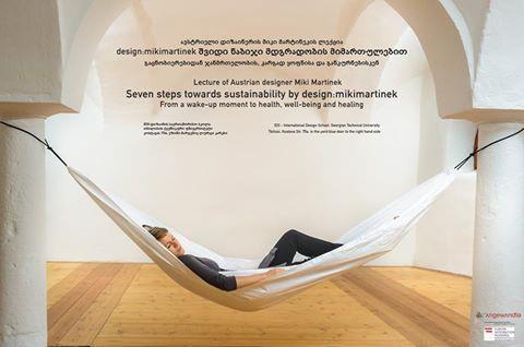 of interests of the Austrian designer: a playful hammock for urban well-being pictured on her poster, crystal glass chandelier she calls no beginning and no end, blankets and cushions for knitted