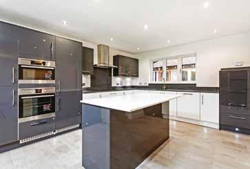 SPECIFICATION Kitchen/Breakfast Room Contemporary range of kitchen wall and base units with LED plinth lights and under unit lighting 20mm Quartz worksurfaces and upstands (Laminate work top to