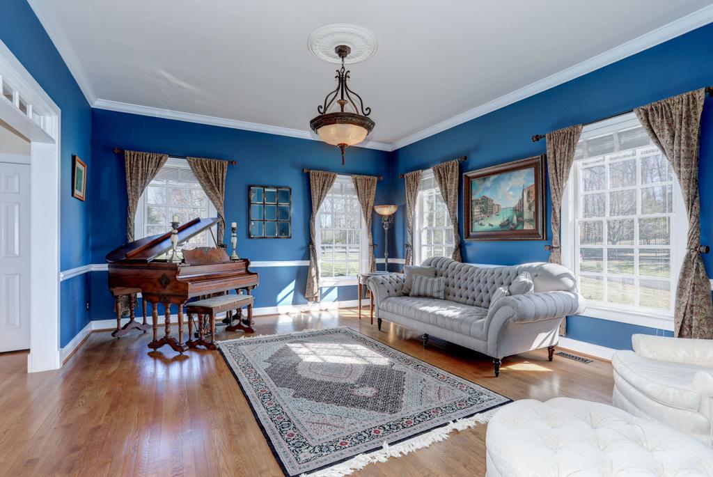 WELCOME HOME 5 Beds 5 Full Baths 1 Hallf Bath Located in the charming Town of Historic Clifton, this spectacular Federal colonial offers an open floor plan that is bright, versatile, and sun-drenched
