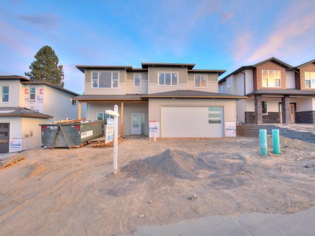 1033 EDGEHILL PLACE Sub Area South Kamloops Current Price $669,900 Style Two Storey Title Freehold Taxes $1,695 (2017) MLS 142213 Original Price $669,900 Age of Dwelling NE Zoning RS-4 DOM 49 Sale