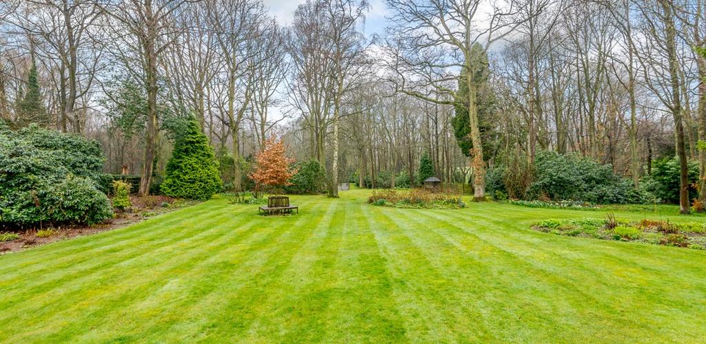 Fabulous mature gardens and grounds, Range of storage & garden sheds, Hard surface tennis court, Cottage garden and large sun terrace, Double garage with