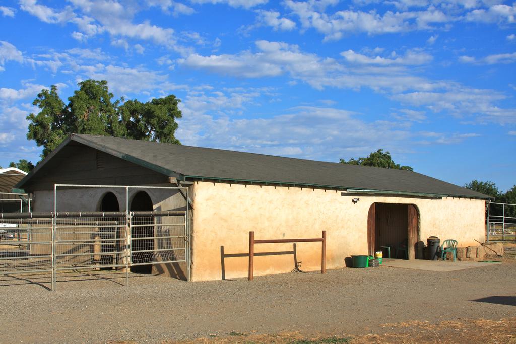 19 acre equestrian facility would be perfect for a family with horses or a boarding stables.