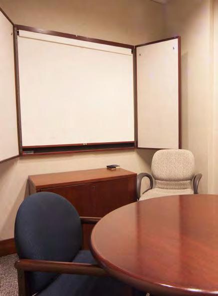 With three private offices and a large open work area, the air-conditioned suite is