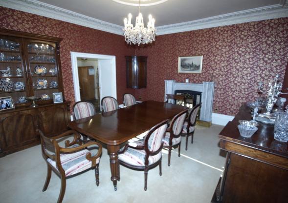 22m) A well proportioned principal reception room which displays as a focal point, a marble fireplace with granite hearth and inset, this in turn containing a Clearview multi-fuel stove.