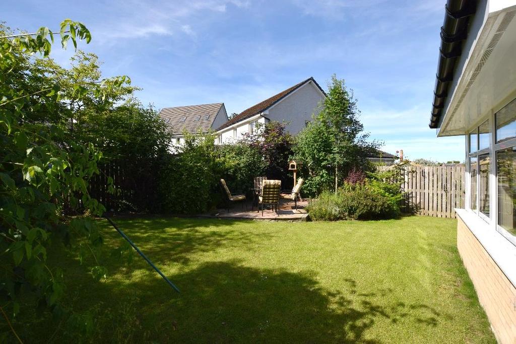 PROPERTY This lovely four bedroom detached villa offers many pleasing features including a sun lounge with a wood burning stove, a modern fitted kitchen with built in appliances and an en-suite