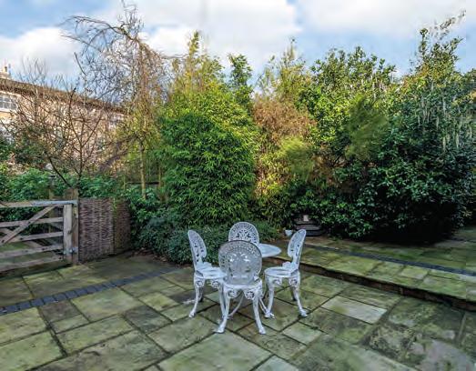 There is a gated access to the small foregarden which is low maintenance with a variety of gravelled areas and Cotswold stone paving that leads to the front entrance door and a gate that