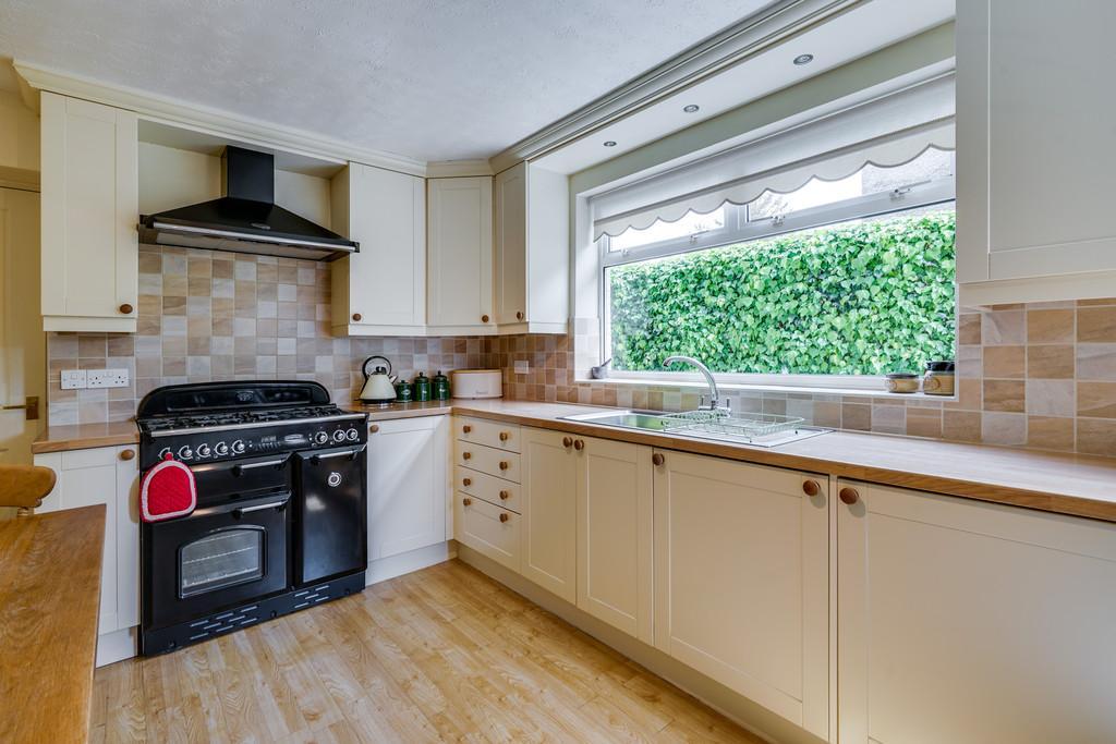 81m) a bright room with dual aspect offering same pleasing country views. Corniced ceiling. Stone fireplace with TV shelf housing gas fire and marble hearth. Telephone point.