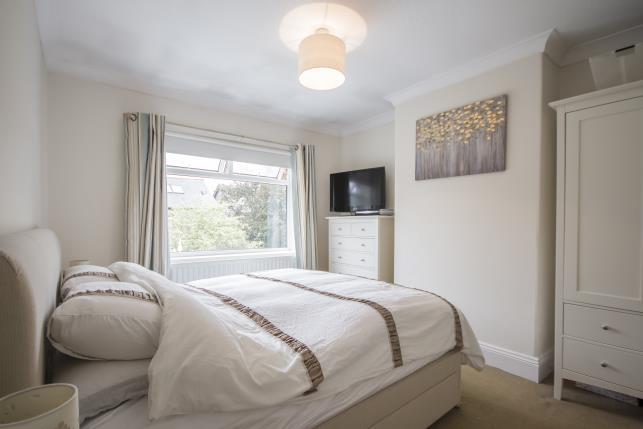 An ideal property for young professionals and families, the property has been lovingly refurbished by the current owners, with fabulous open plan reception space leading to a conservatory, and three
