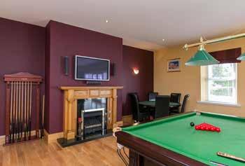 01m) Fully equipped games room with full length snooker table.