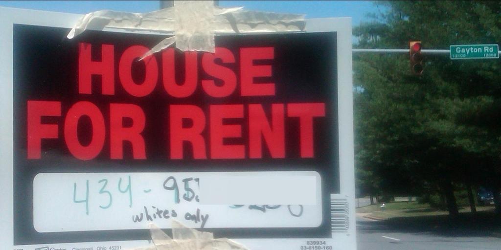 Sign posted at busy intersection in Richmond, VA July 2011