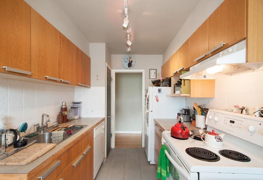 The units feature kitchens which have ample updated cabinet space, a double sink, arborite counter tops,