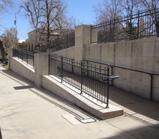 Barrier-free access structures providing access to existing buildings as required by the Americans with Disabilities Act or Denver Accessibility Standards, when no alternative locations are