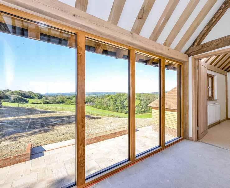 Summerhill Barn A superb barn conversion finished to a high specification with far reaching views of the surrounding countryside at the rear.