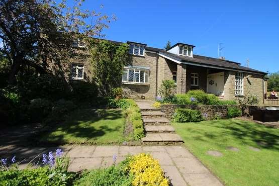 Large landscaped garden and car parking area with great patio and entertaining areas.