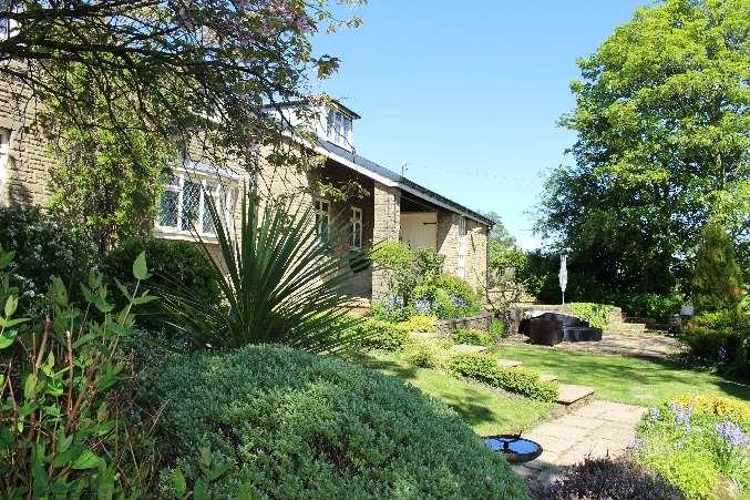 Outside Sitting within plentiful grounds this property has a large gated tarmac driveway and ample parking for numerous cars.