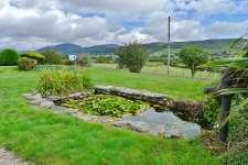 SOVAL LODGE IN BRIEF Large detached villa on the outskirts of Blackwaterfoot Downstairs bedroom and shower/wet room Spectacular views over the Shiskine Valley and Firth of Clyde Detached garage and