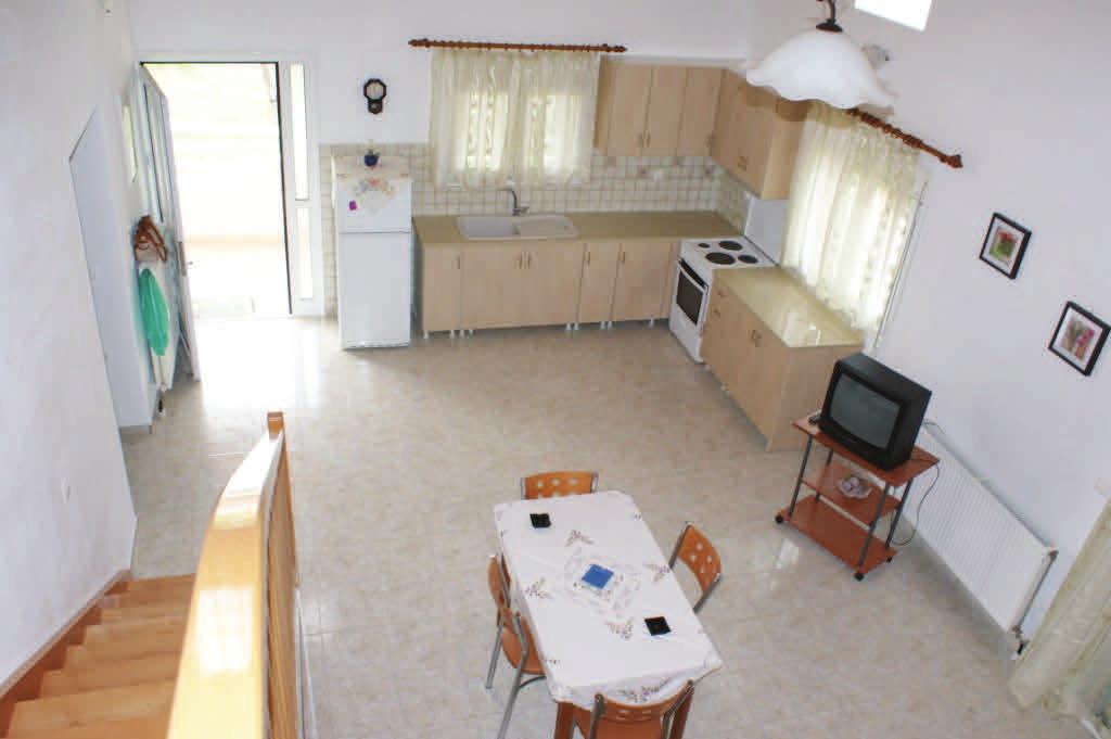 On the ground level the lounge and open plan kitchen are situated as well as the bedroom and