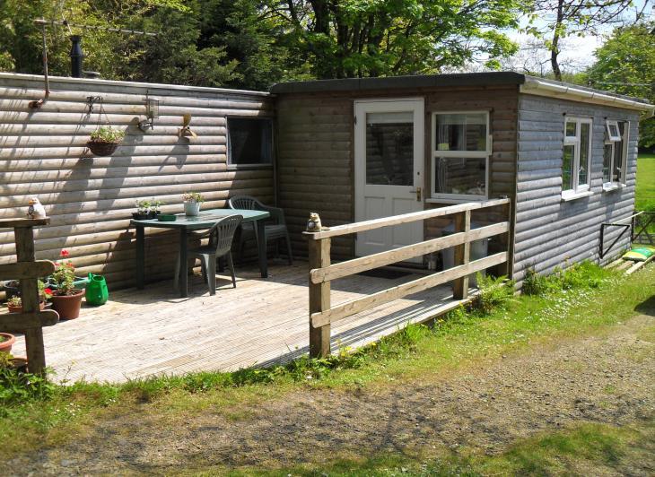 The Annexe At the bottom of the site is a detached 2 bedroom static caravan that has been clad in wood which