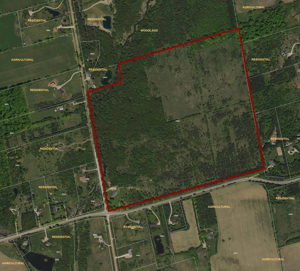 Figure 2 Surrounding land uses are a mix of rural residential parcels and agriculture with patches of woodland (subject property outlined in red). 1.