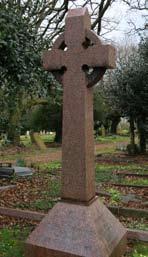 1913) His grave is a fine Celtic cross laid out on the ground. It is in a style called Arts and Crafts.