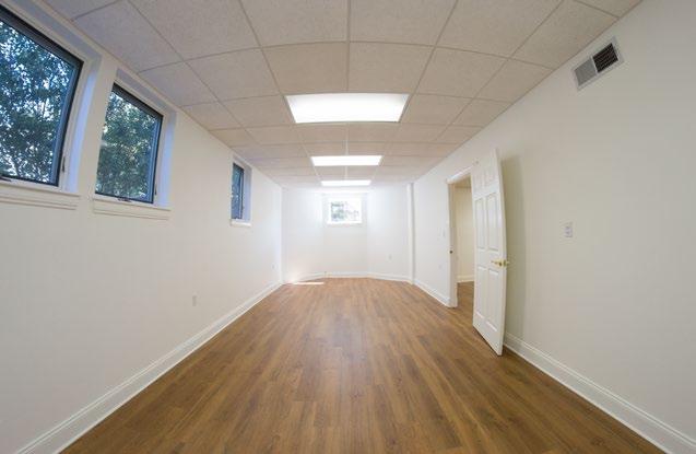The office suite features brand new flooring and paint, two large private offices, reception area, storage