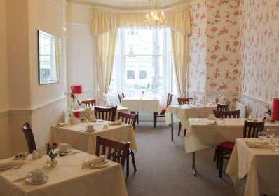 THE VERY WELL PRESENTED DOUBLE FRONTED ELEVEN BEDROOM HOTEL is situated on the North Parade, Llandudno with limited views from the front elevation to the promenade and having all of Llandudno's