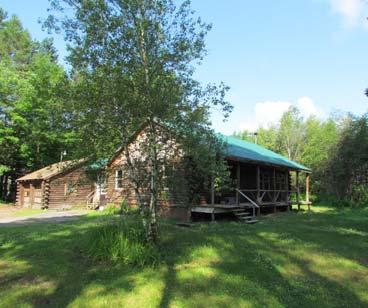 Separate storage shed CABIN WITH POND RANCH HOME ON 8.