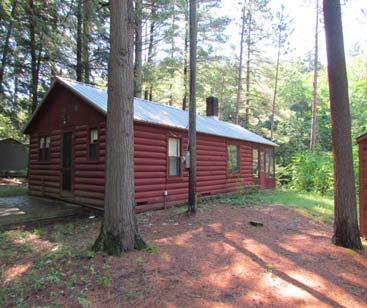 5 bath log home close to school with partitioned basement & 2 car attached