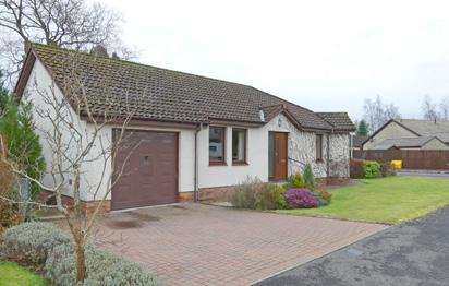 EXTERNAL This delightful family home enjoys beautifully maintained garden grounds.