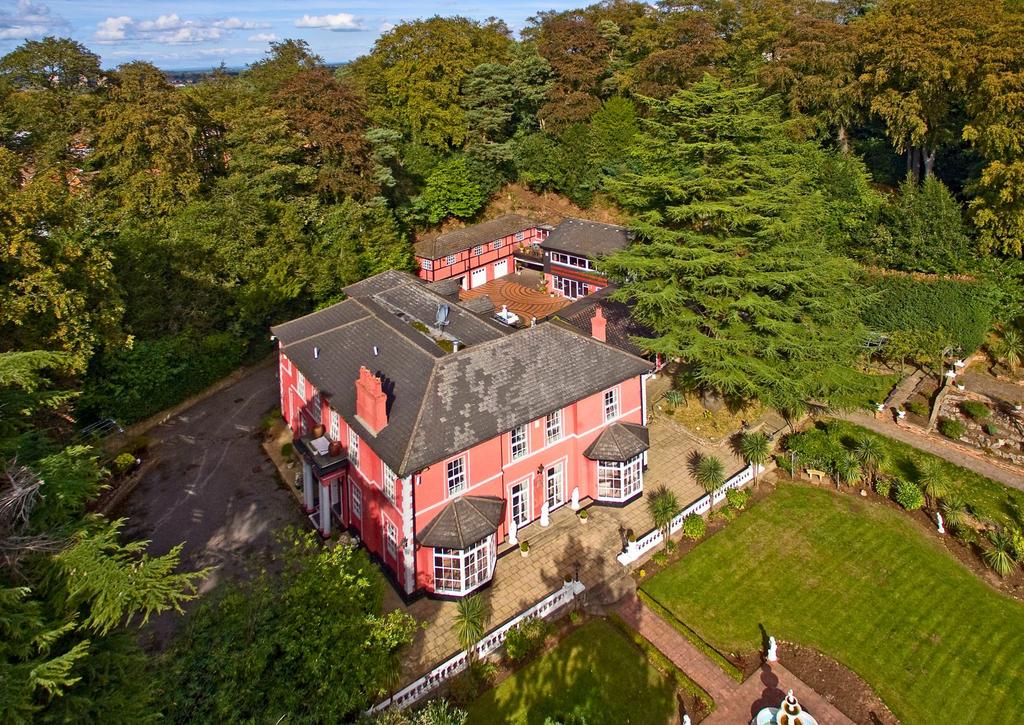 EARLSWOOD HOUSE STOURBRIDGE ROAD LOWER PENN SOUTH STAFFORDSHIRE WV4 5NG A fine compact, country estate providing extensive living accommodation together with superb entertaining areas including an