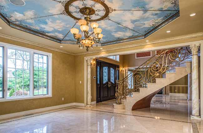 Boasting 10,000 square feet of elegant living space on two massive levels plus an enormous fully-finished basement hideaway, the estate s grand light-filled