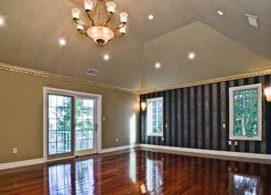 Great Room Entertaining is divine in the phenomenal great room adorned with soaring 25-foot hand-painted gold faux coffered ceilings, a striking floor-to-ceiling