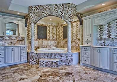 moldings, Golden Macaubas granite counters, honey onyx backsplash, a 1400-pound one-piece limestone and Travertine hood filled and honed from Canada, a double-door