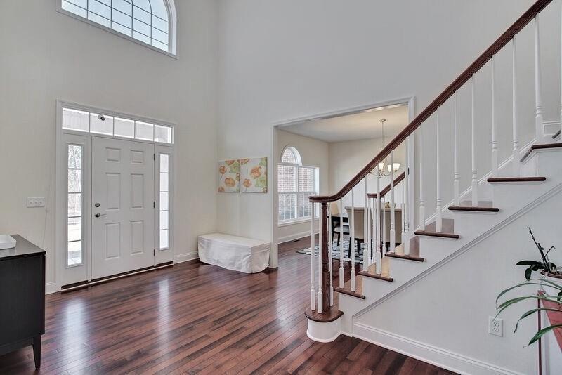 Foyer: The sun filled Foyer creates a gracious and warm welcome to this beautiful center-hall colonial home.