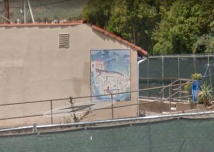 The stucco removal also incurred the loss of a local Landon mural that was located on the front porch.