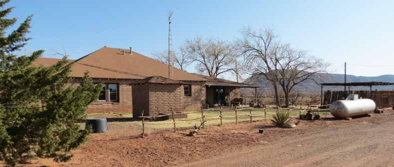 Ranch headquarter improvements include a comfortable three bedroom two bath home and
